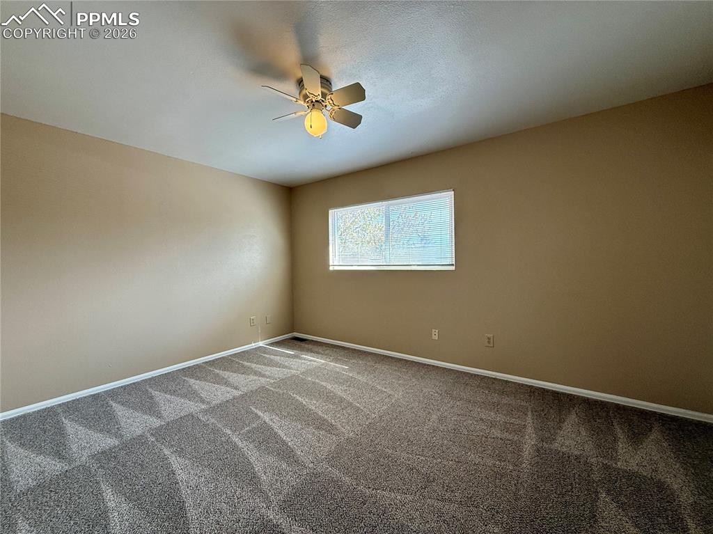 Image 14 of 18: Primary bedroom with separate entrance to the bathroom.