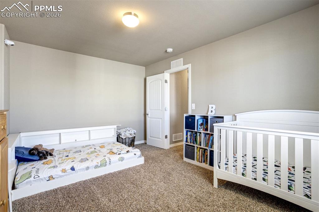 Image 28 of 49: Bedroom