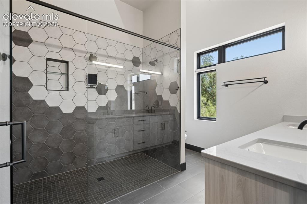 Image 21 of 50: Spa Shower with Custom Tilework