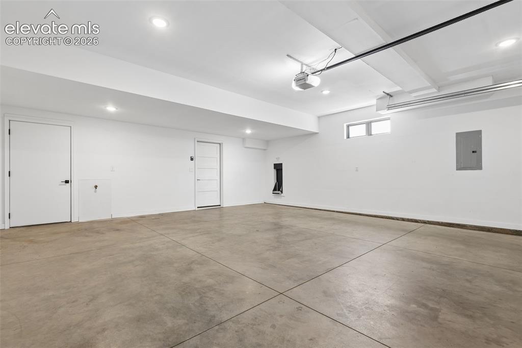 Image 43 of 50: Oversized, Finished 2 Car Garage