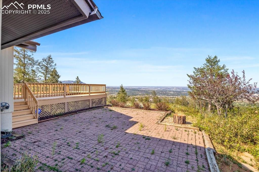 Image 31 of 38: View of patio / terrace with a deck