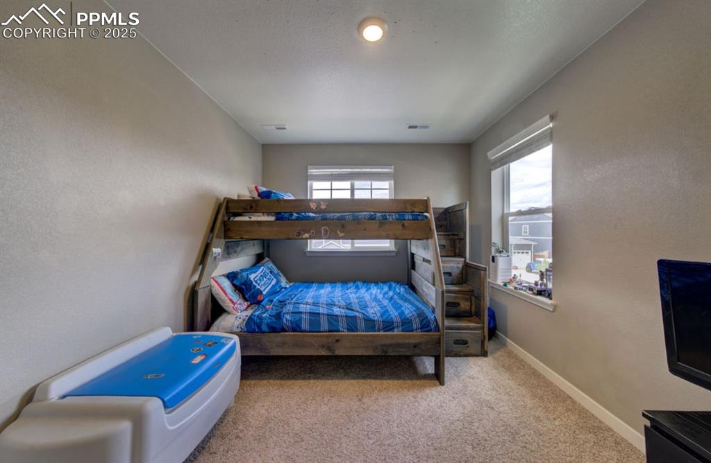 Image 18 of 28: Bedroom