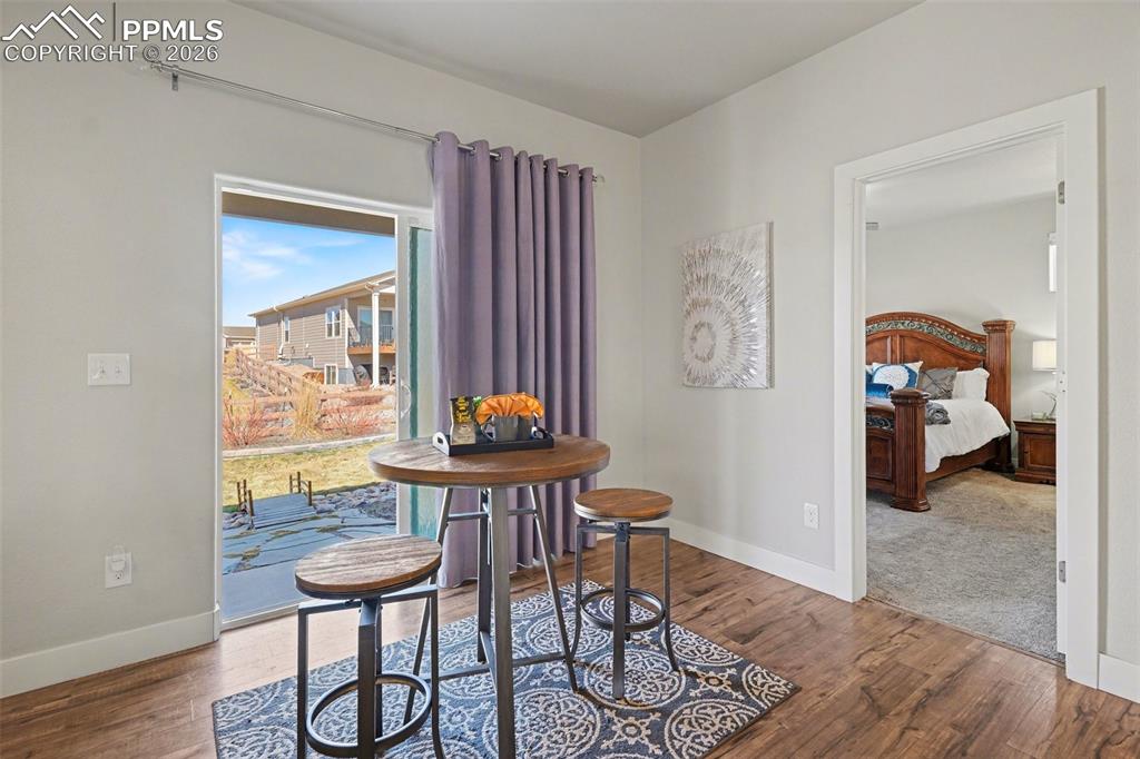 Image 19 of 37: Walk-out access to the backyard extends the living area outdoors, perfect f