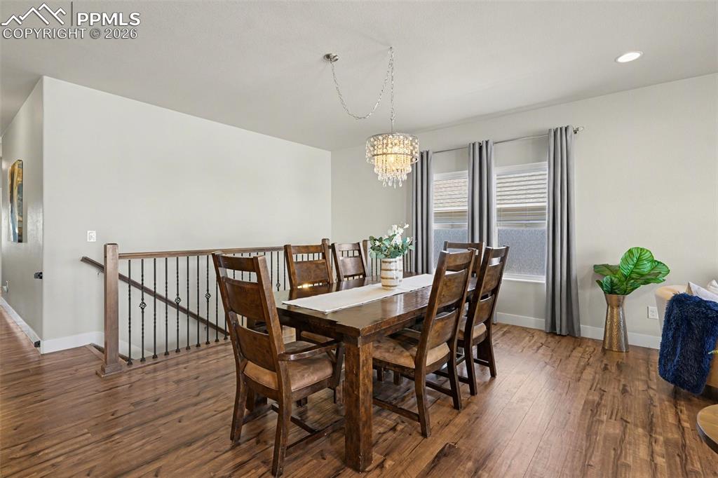 Image 21 of 37: The living area connects effortlessly to the dining space, highlighted by a