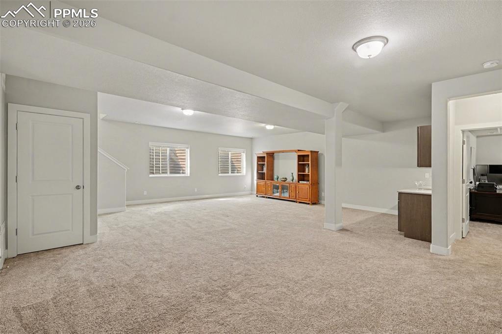 Image 30 of 37: The open layout provides plenty of room for relaxing, spending time with fa