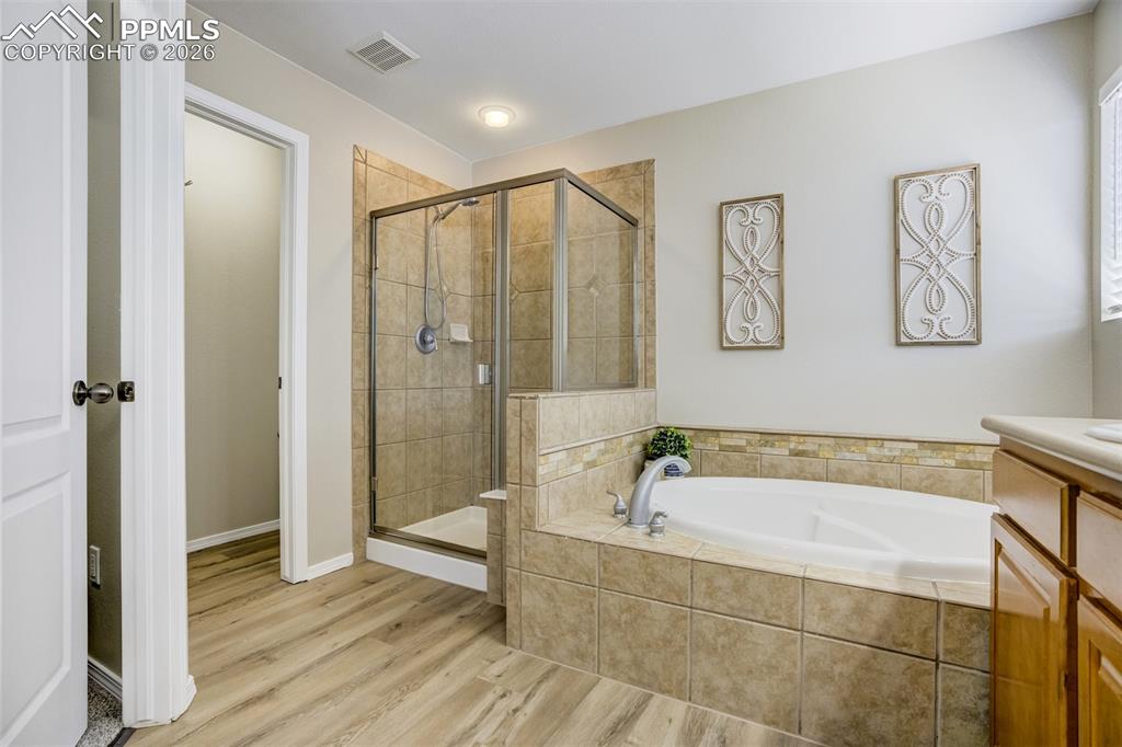 Image 28 of 49: Master Bathroom