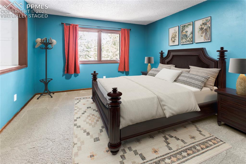 Image 15 of 34: Main Level Bed 3 - virtually staged