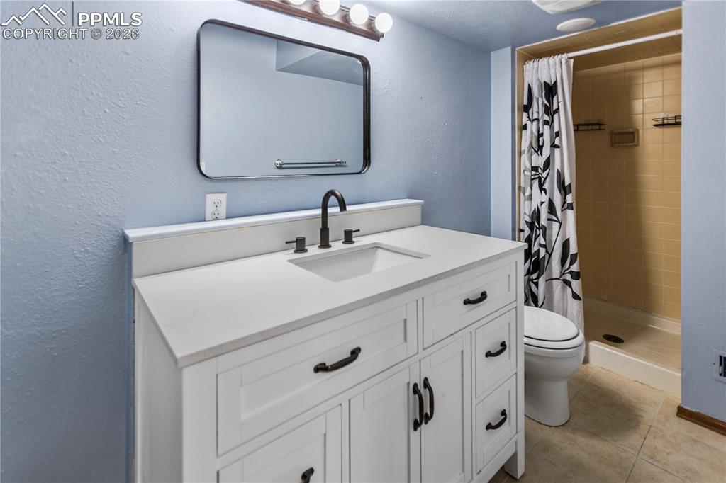 Image 18 of 21: Lower Level Bath