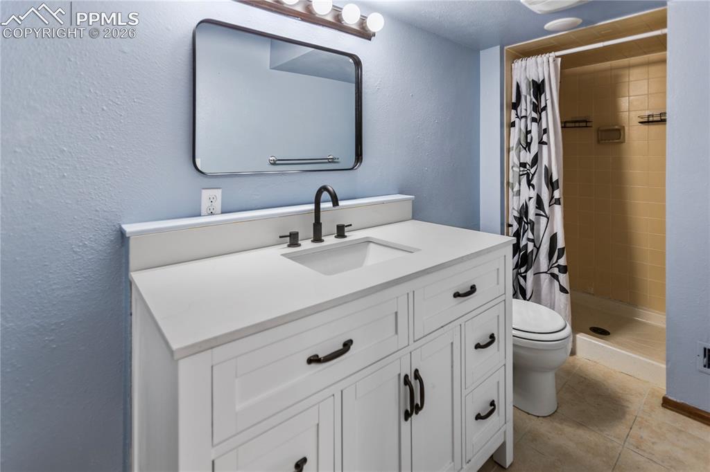 Image 18 of 34: Lower Level Bath