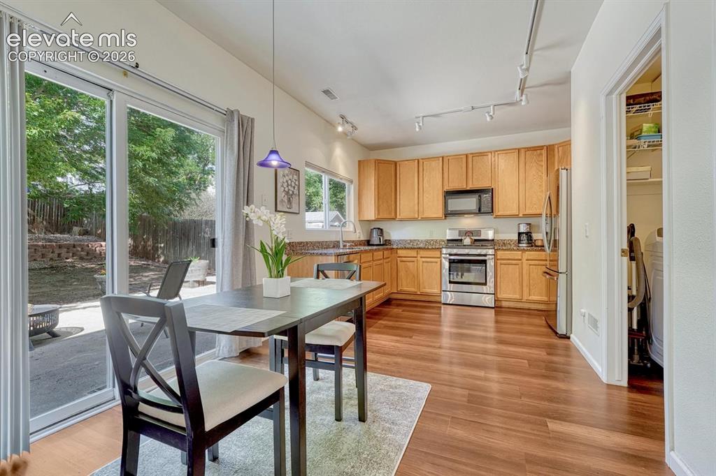 Image 15 of 50: Dining room walks out to back yard