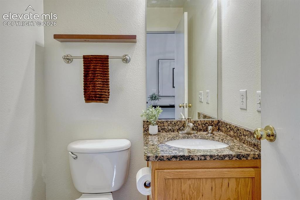 Image 18 of 50: Main level powder bathroom