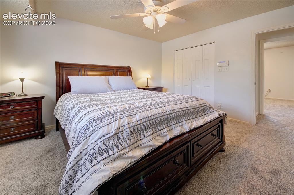 Image 11 of 26: Master bedroom has ceiling fan