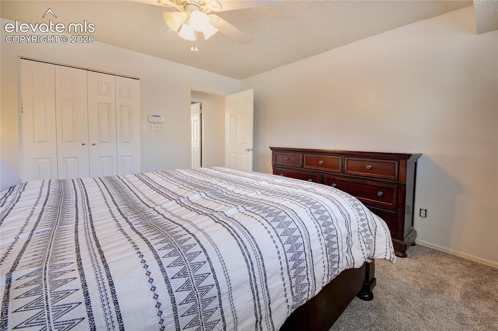 Image 12 of 26: Master bedroom another view