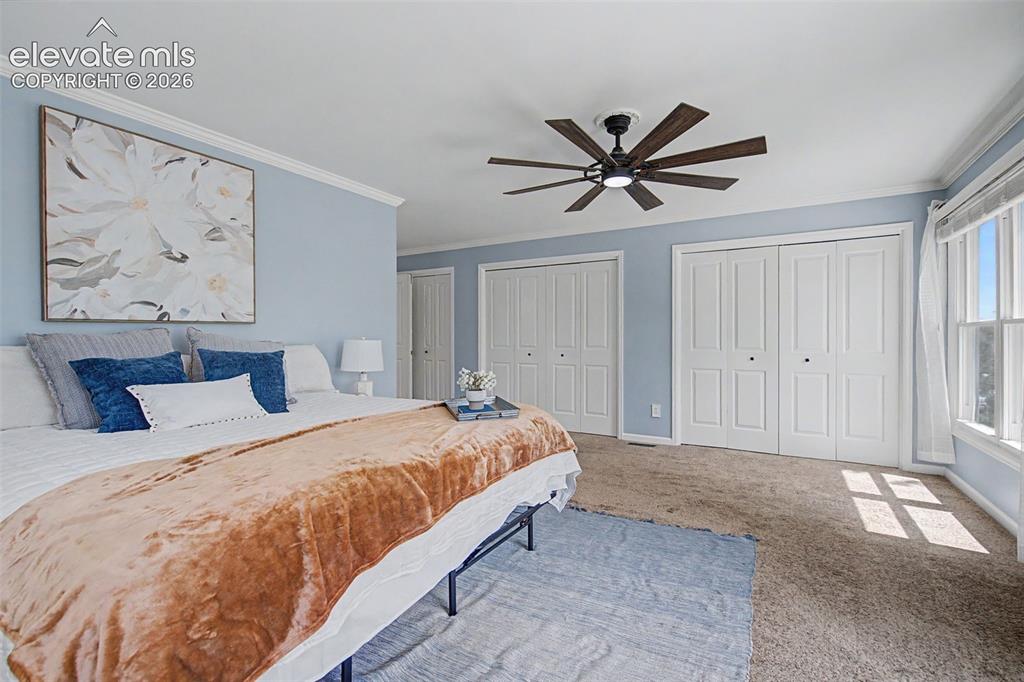 Image 27 of 47: Primary Suite with an entire wall of closets!