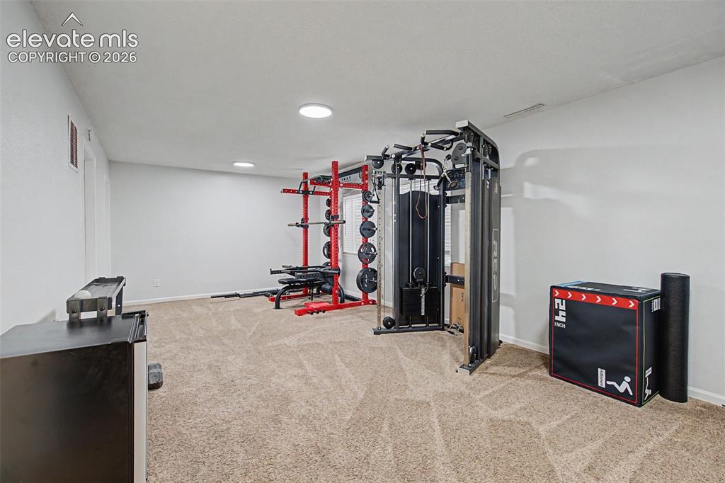 Image 34 of 47: Basement Rec room