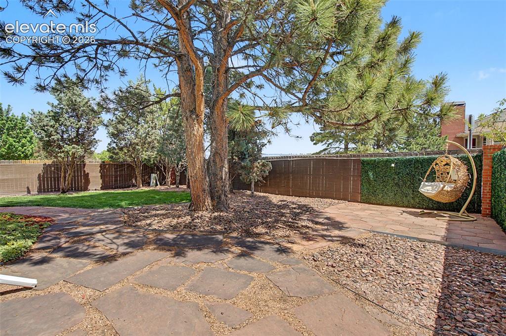 Image 40 of 47: Large Yard with multiple entertaining spaces