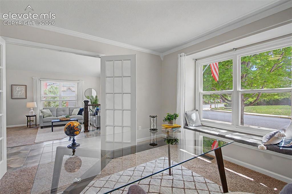 Image 5 of 47: Dedicated office with Crown Molding