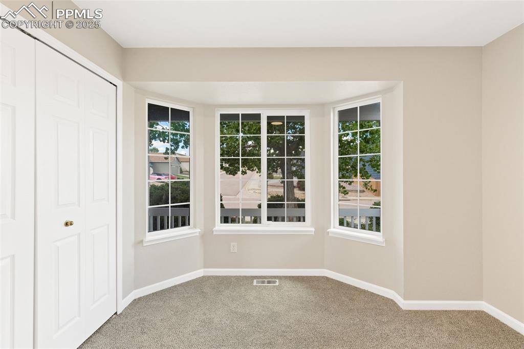 Image 10 of 50: Front bedroom