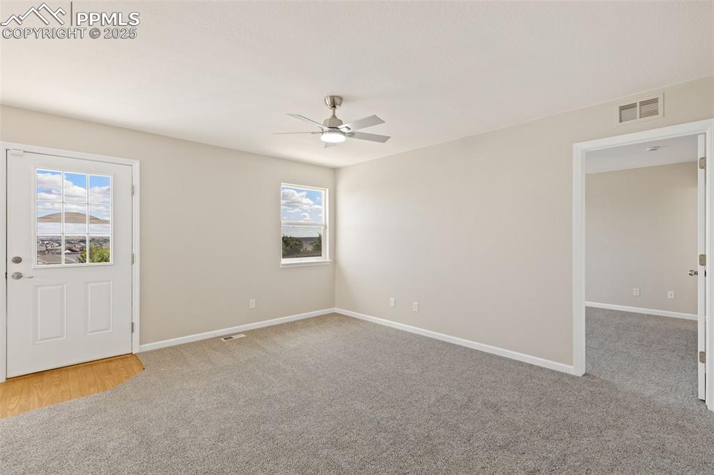 Image 15 of 50: Fresch paint and carpet throughout the home