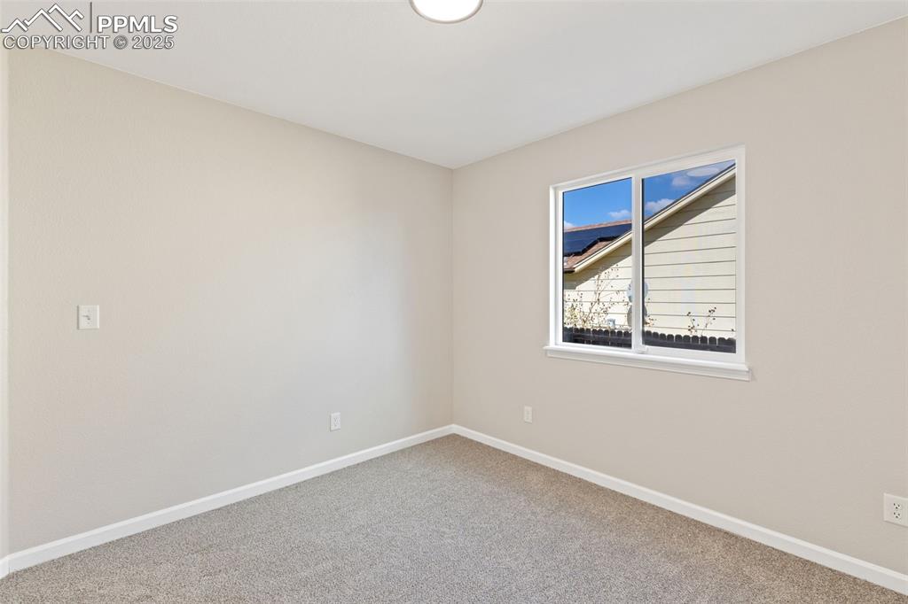 Image 30 of 50: Second front bedroom