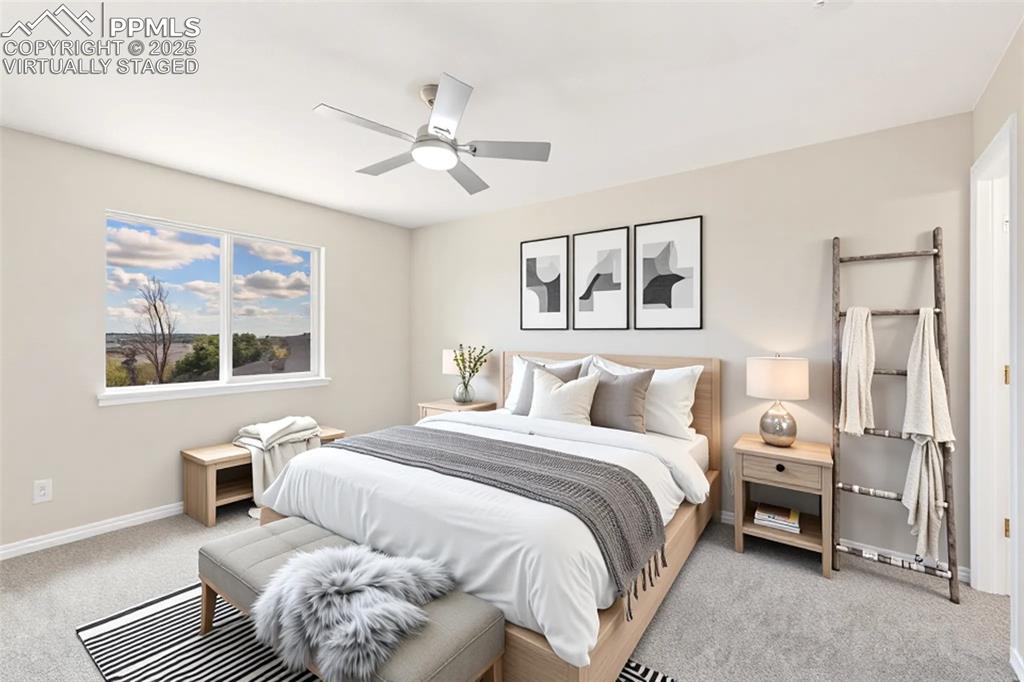 Image 35 of 50: Virtually Staged-another possible furniture arrangement in main bedroom.