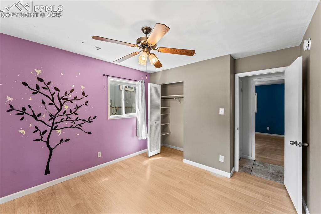 Image 16 of 27: Unfurnished bedroom featuring wood finished floors, a closet, and a ceiling