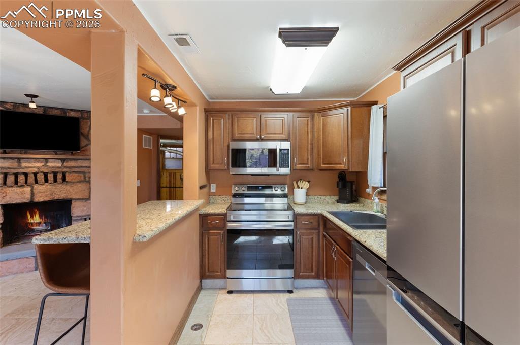 Image 11 of 35: main level kitchen