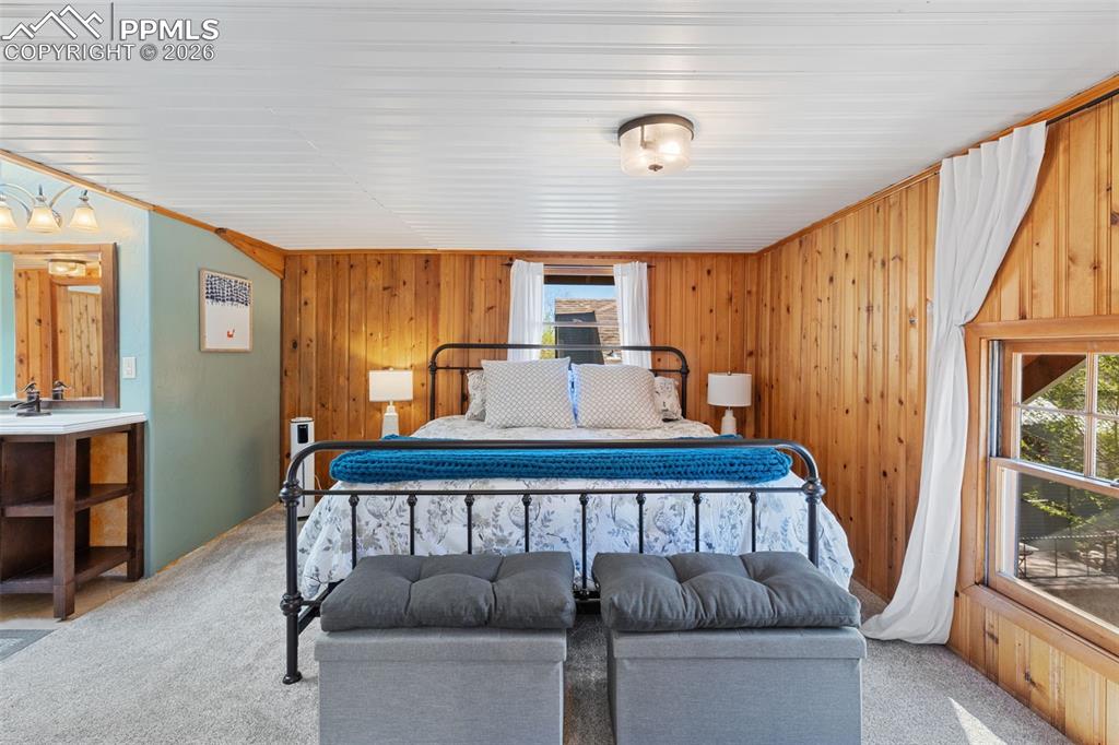 Image 19 of 35: upper level primary bedroom