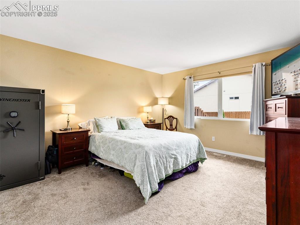 Image 8 of 17: Spacious Master Bedroom has a walk ini closet, plenty of storage and a bath