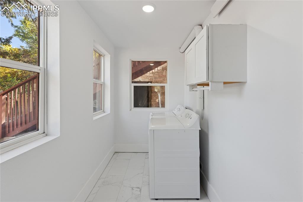 Image 21 of 45: Main-level flat laundry