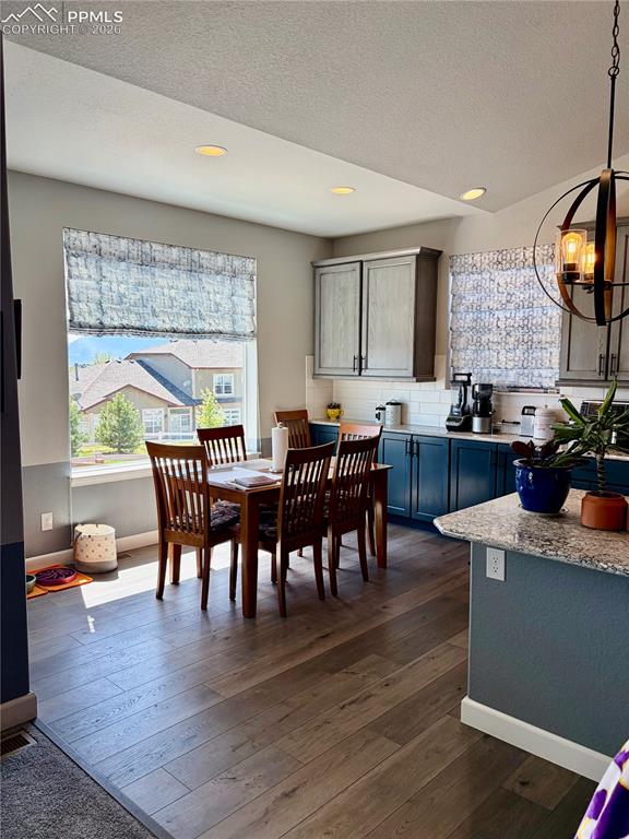 Image 14 of 50: Eating nook with walkout to the back patio