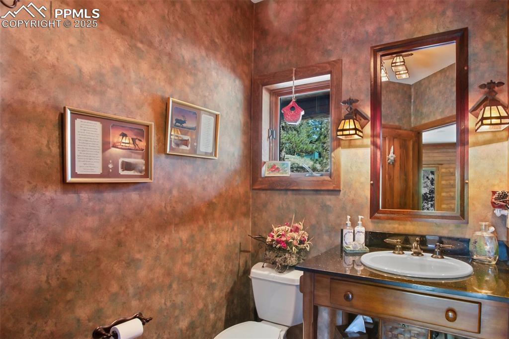 Image 16 of 50: Main floor powder room