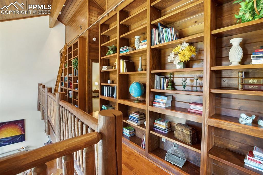 Image 26 of 50: Library in the upper level loft