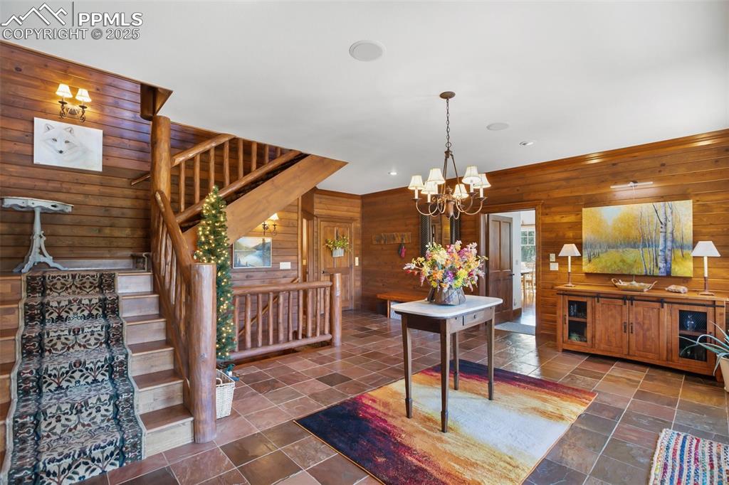Image 5 of 50: Formal entry, with two staircases, and an elevator! 