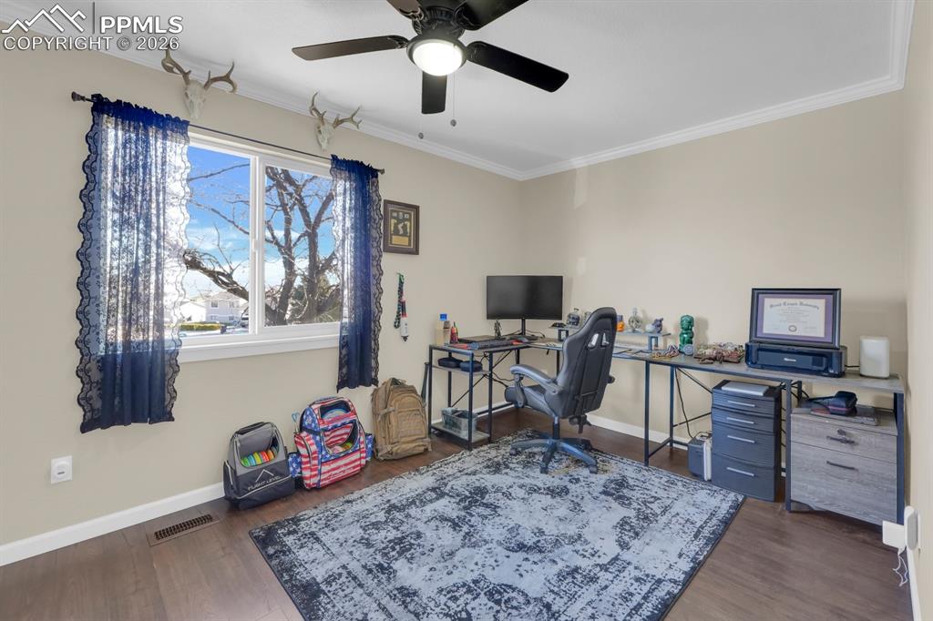 Image 14 of 29: Primary Bedroom Currently Used as Office