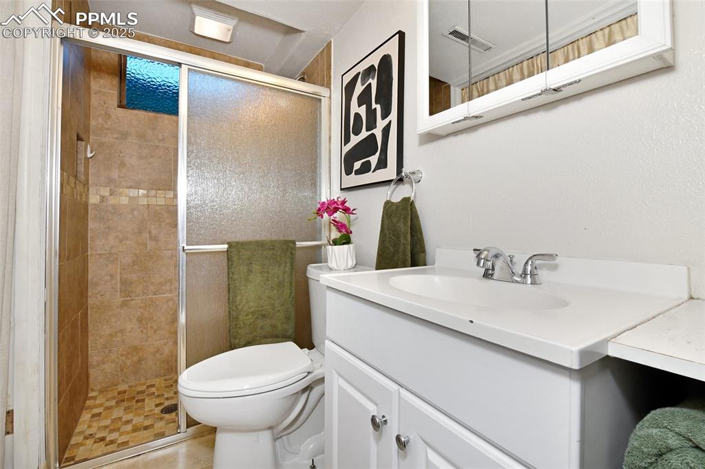 Image 21 of 35: 3/4 bath in basement