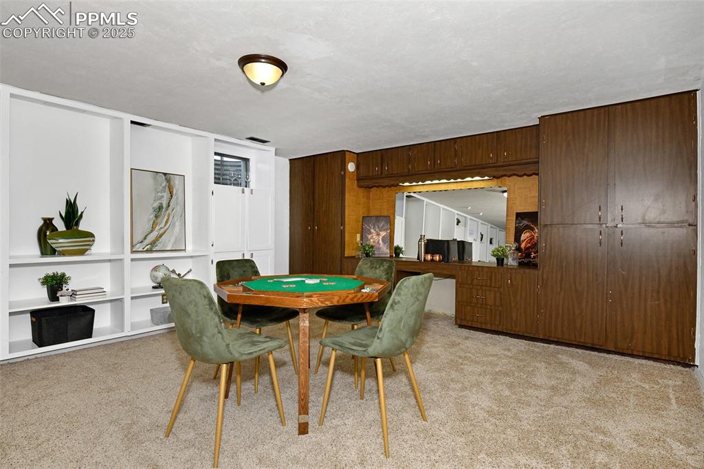 Image 26 of 35: Sewing/craft station at the back offers plenty of storage for your supplies