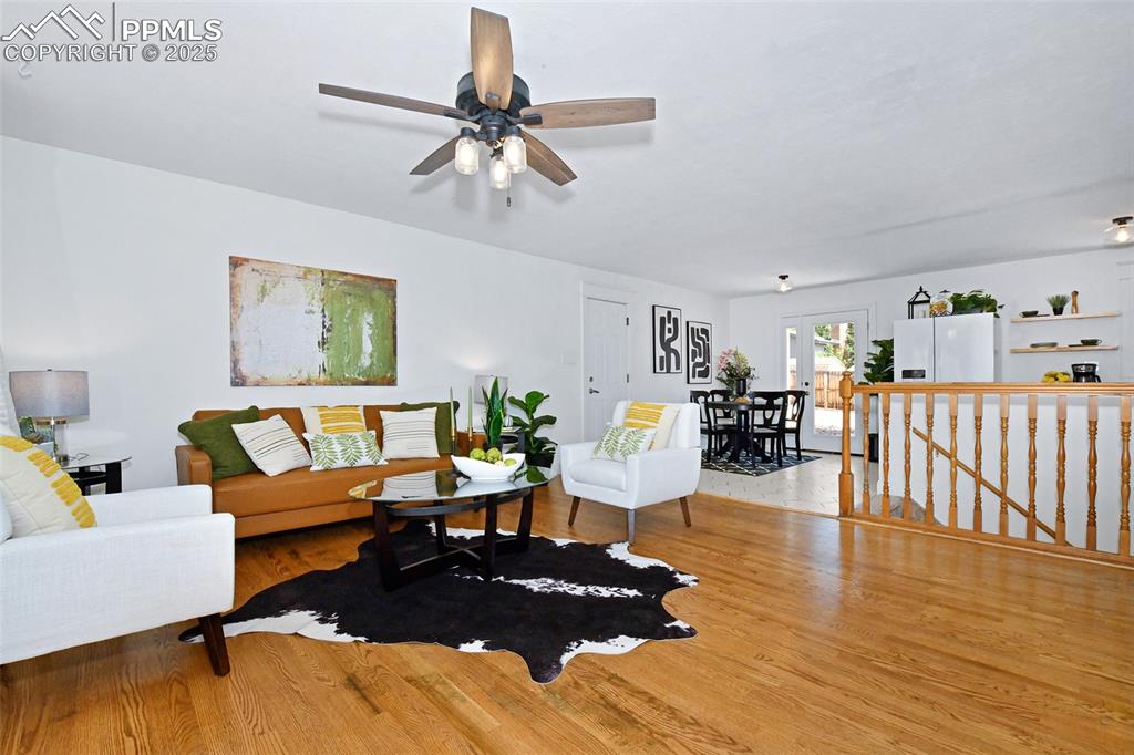 Image 5 of 35: Gleaming red oak floors on main level!