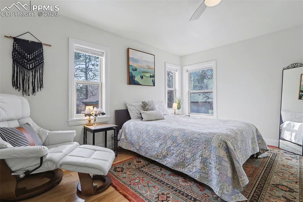 Image 13 of 29: The home has bedroom on both the main and upper levels of the home.