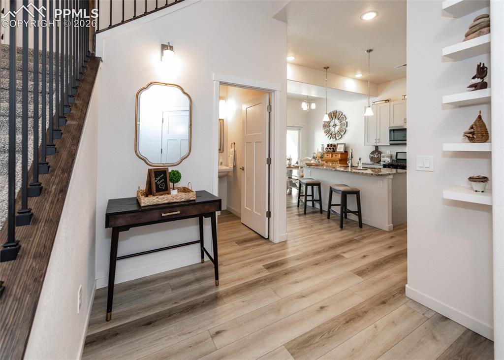 Image 7 of 49: Foyer featuring light wood-style flooring and recessed lighting