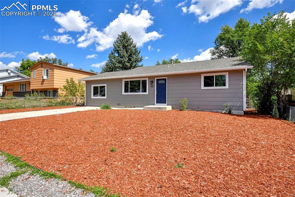 Caption: Ranch-style home featuring a shingled roof