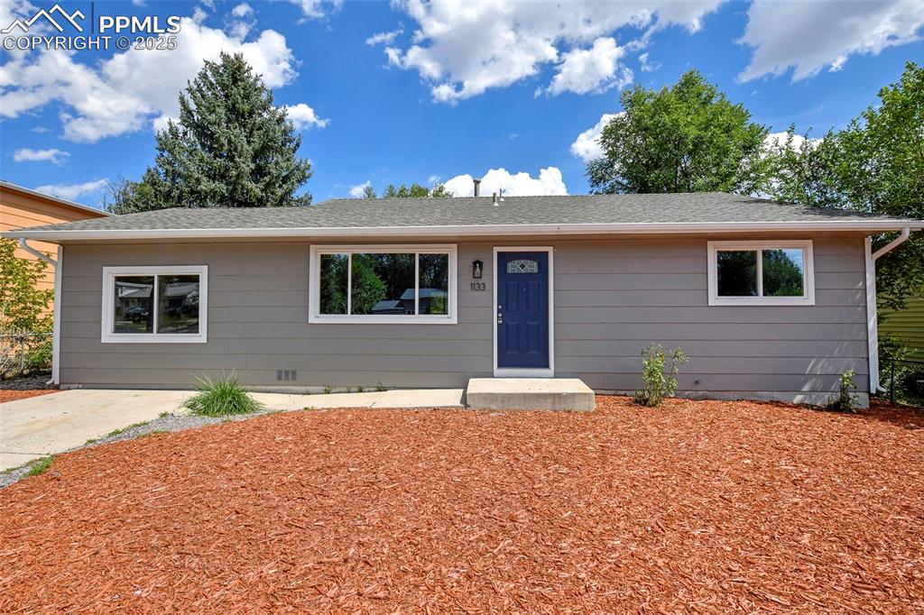 Image 19 of 25: Ranch-style home with roof with shingles and crawl space