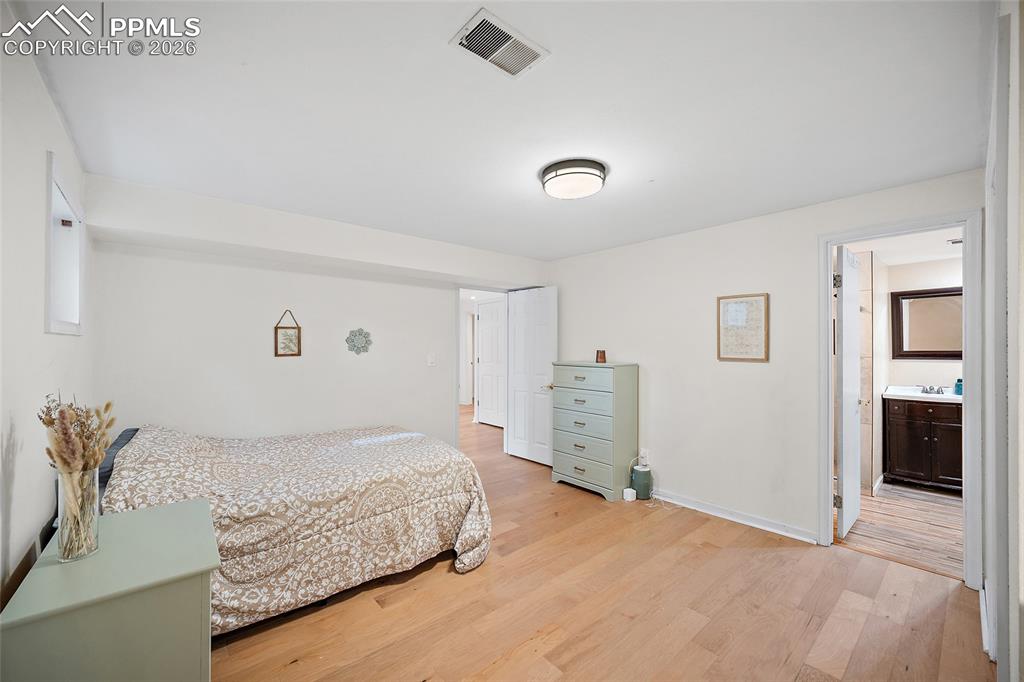 Image 26 of 50: Basement Bedroom