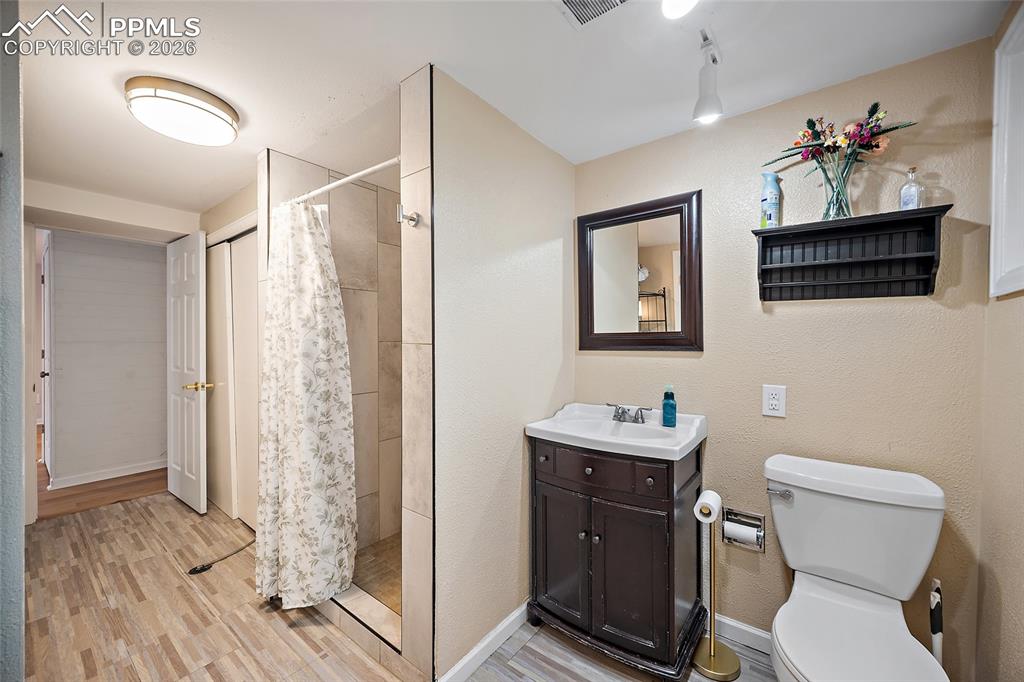 Image 27 of 50: Basement Bathroom