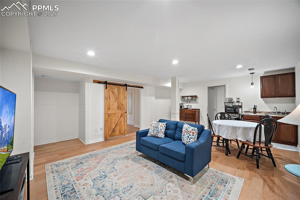 Image 29 of 50: Basement Livingroom