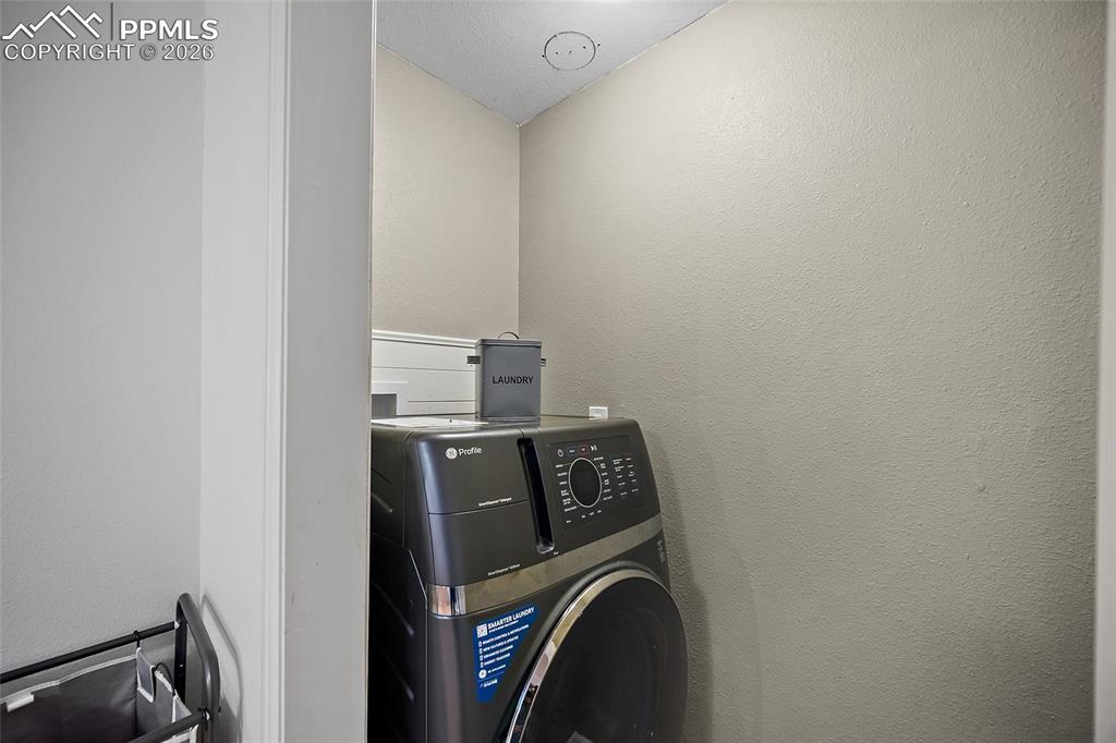 Image 33 of 50: Basement Laundry