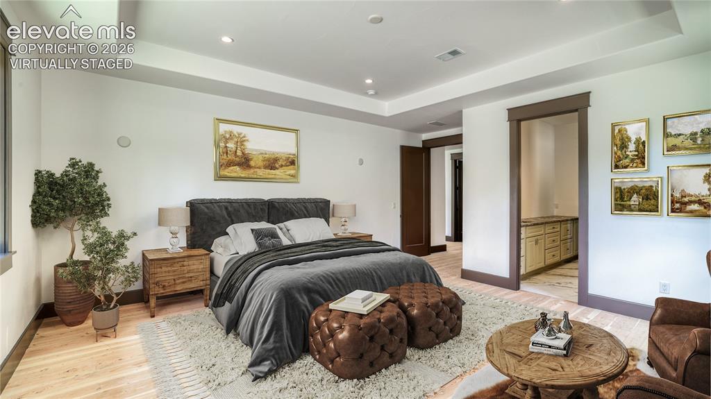 Image 15 of 37: VIRTUALLY STAGED
MAIN LEVEL MASTER BEDROOM SUITWE