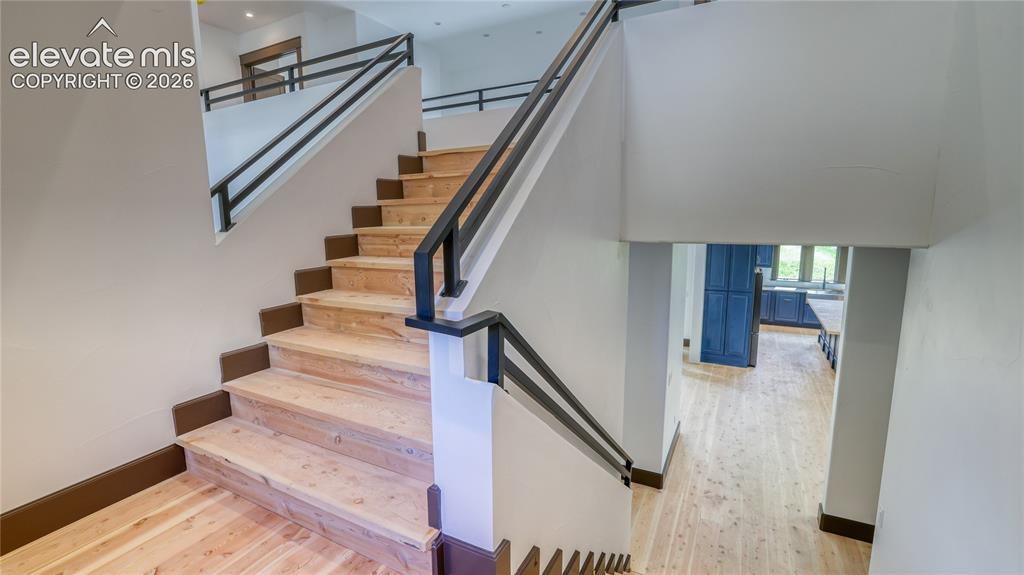 Image 17 of 37: STAIRWAY TO 2ND LEVEL