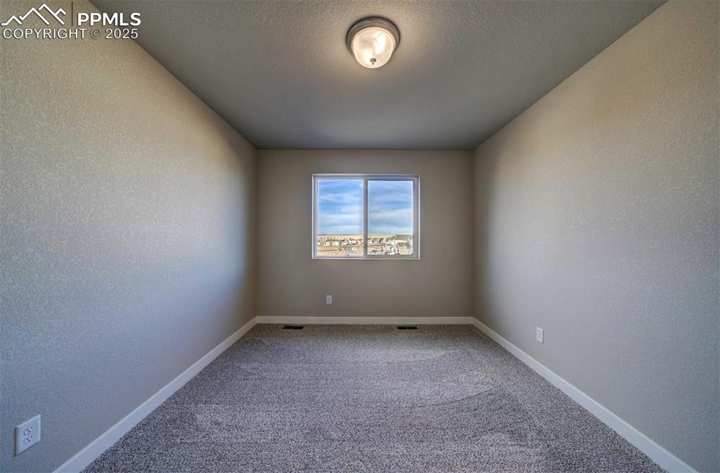 Image 24 of 38: Bedroom