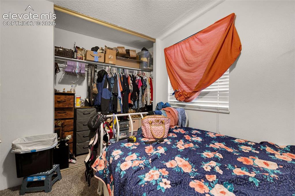 Image 24 of 28: Bedroom
